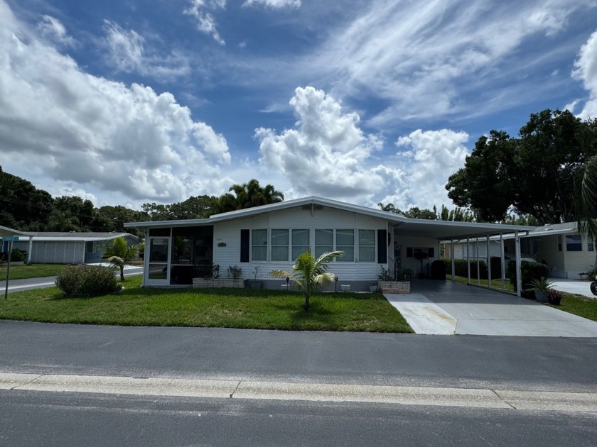 THIS HOME IS ON LEASED LAND WITH AN APPROXIMATE MONTHLY LOT - Beach Home for sale in Sarasota, Florida on Beachhouse.com