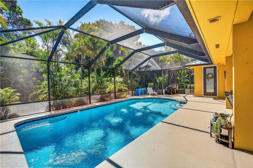 Set on a .45 acre private oasis, this custom residence features - Beach Home for sale in Vero Beach, Florida on Beachhouse.com