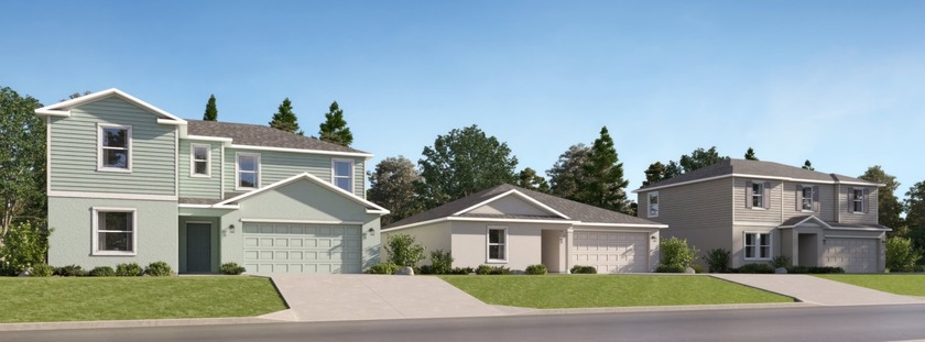 The first floor of this two-story home shares an open layout - Beach Home for sale in Lehigh Acres, Florida on Beachhouse.com