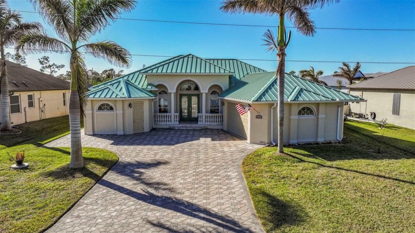 Welcome home to this custom built house nestled along the serene - Beach Home for sale in Port Charlotte, Florida on Beachhouse.com