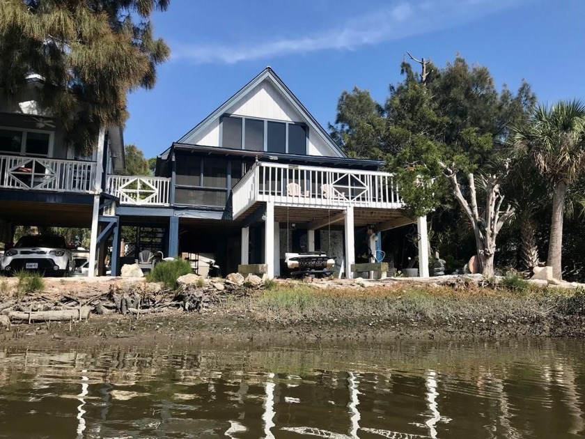 This elevated home sits right on the sparkling Gulf of Mexico - Beach Home for sale in Cedar Key, Florida on Beachhouse.com