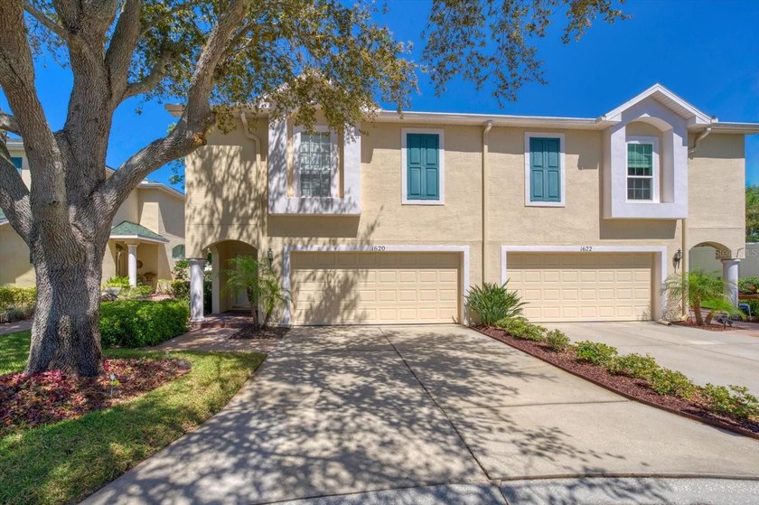 Location, Location, Location! Tucked away on a tree-lined - Beach Townhome/Townhouse for sale in Clearwater, Florida on Beachhouse.com