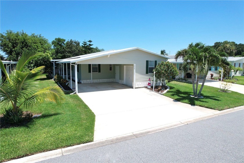 Beautifully maintained home built in 2002, offering over 1,500 - Beach Home for sale in Barefoot Bay, Florida on Beachhouse.com