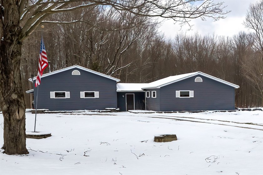 Welcome to 11466 Springfield Road in Girard! Nestled on - Beach Home for sale in Girard, Pennsylvania on Beachhouse.com