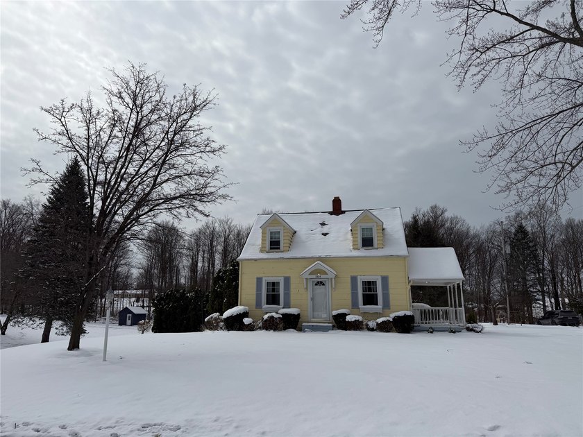 Charming Cape Cod nestled on a spacious double corner lot in a - Beach Home for sale in Erie, Pennsylvania on Beachhouse.com