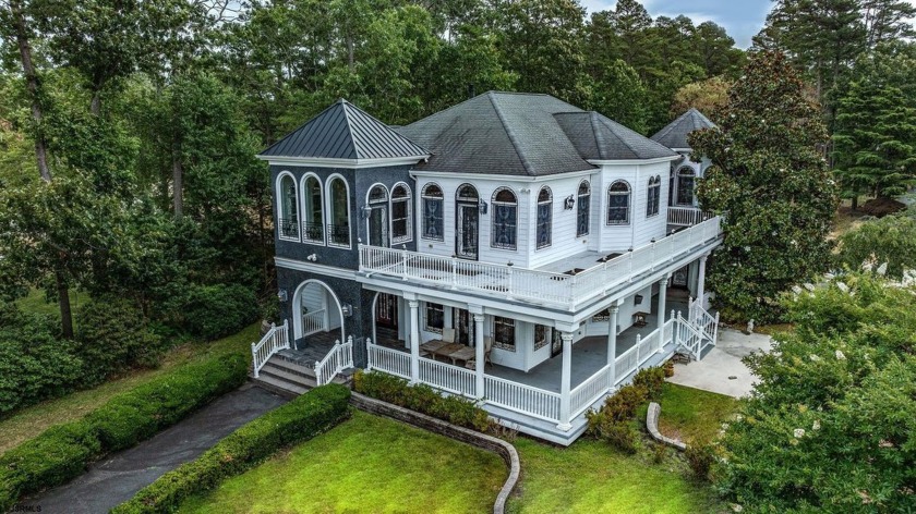 Experience the pinnacle of luxury at this expansive RIVERFRONT - Beach Home for sale in Mays Landing, New Jersey on Beachhouse.com