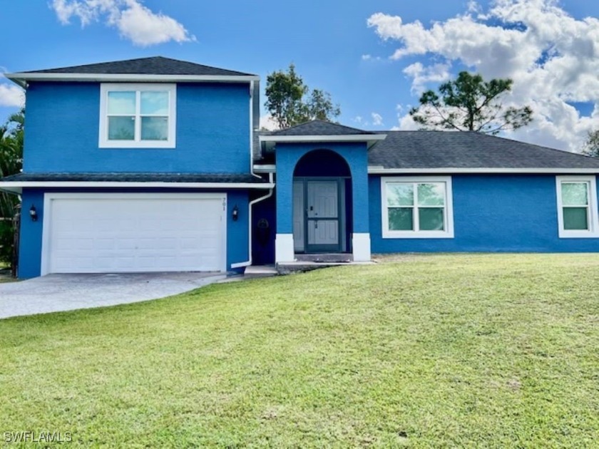 Beautiful 2 story 3-bedroom, 2-Bath, 2-Car Garage on an - Beach Home for sale in Lehigh Acres, Florida on Beachhouse.com