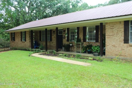 3 bedroom, 2 bath featuring a large living with a wood buring - Beach Home for sale in Moss Point, Mississippi on Beachhouse.com