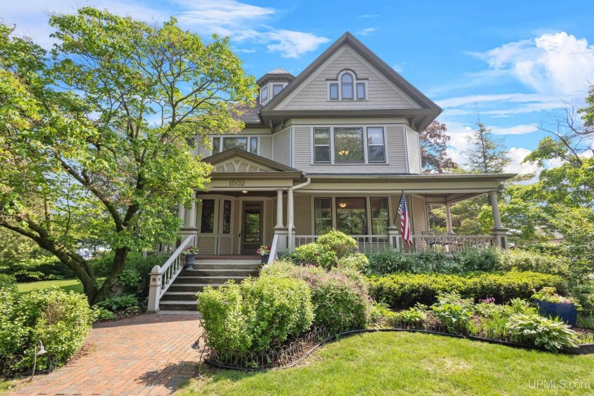 Welcome to an exquisite slice of history nestled on a stunning - Beach Home for sale in Menominee, Michigan on Beachhouse.com