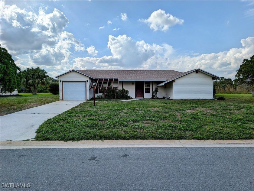 This charming single-family home is situated on a spacious lot - Beach Home for sale in Lehigh Acres, Florida on Beachhouse.com