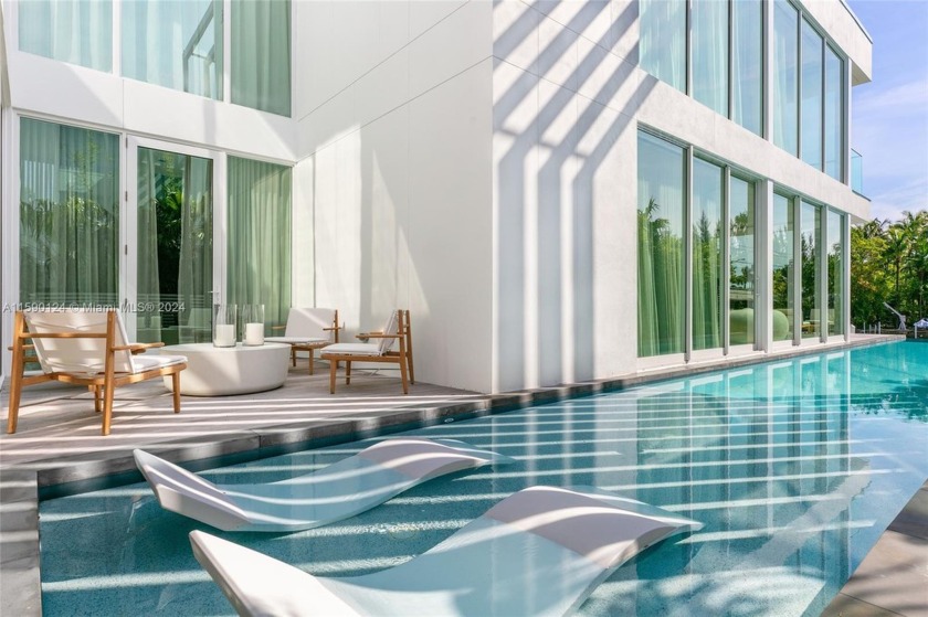 Experience the ultimate waterfront luxury at the Ritz Carlton - Beach Home for sale in Miami Beach, Florida on Beachhouse.com