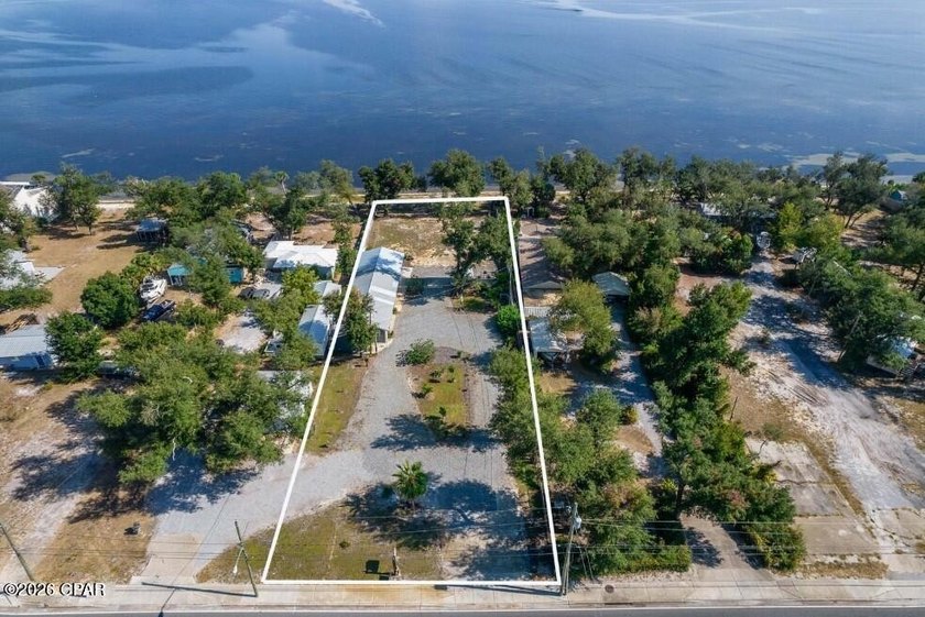 Enjoy exceptional waterfront living on this stunning .75-acre - Beach Lot for sale in Panama City, Florida on Beachhouse.com