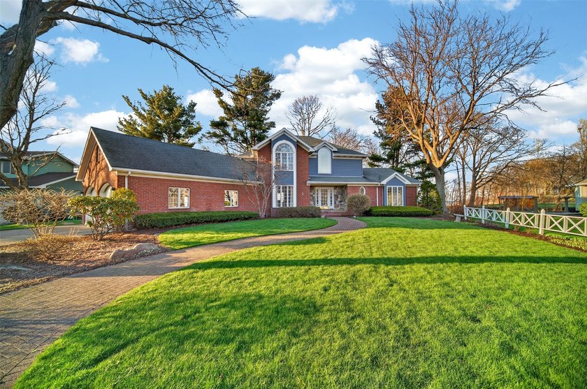 Rare opportunity to own 100 feet of private, tree-lined Lake - Beach Home for sale in Erie, Pennsylvania on Beachhouse.com