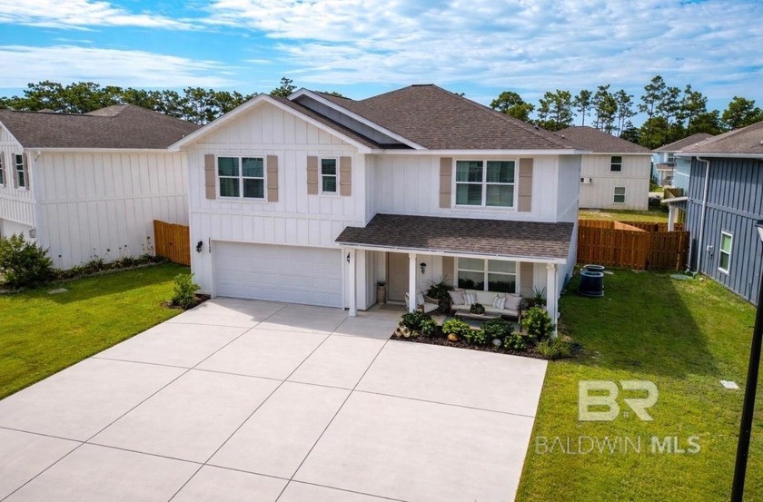 This spacious 5-bedroom, 3-bath home is located just minutes - Beach Home for sale in Orange Beach, Alabama on Beachhouse.com