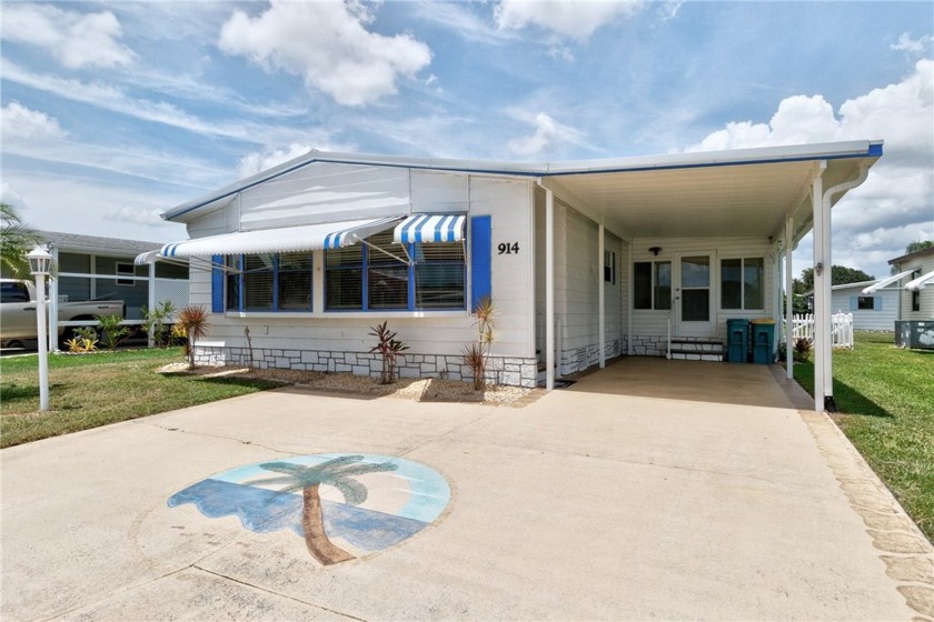 I LOVE THIS HOME! Over 1,300 sq. ft. of comfort and charm. Enjoy - Beach Home for sale in Barefoot Bay, Florida on Beachhouse.com