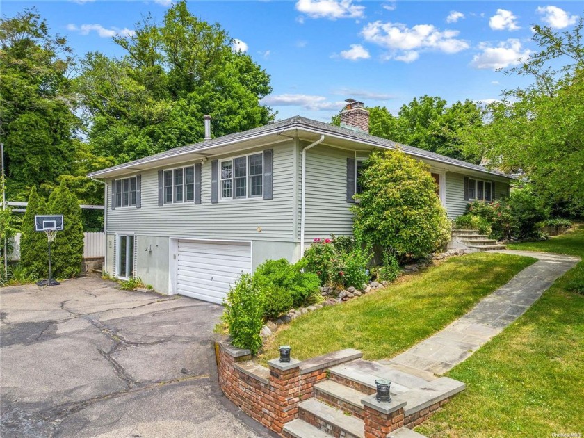 Experience the charm and elegance of this Hi-Ranch property - Beach Home for sale in Oyster Bay, New York on Beachhouse.com