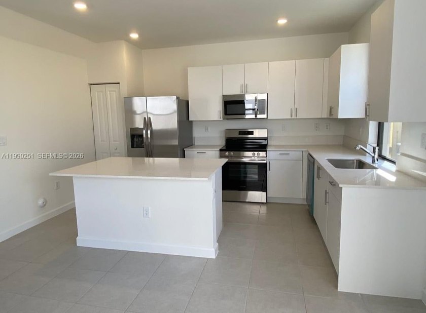 Added efficiency and income potential define this beautiful - Beach Townhome/Townhouse for sale in Goulds, Florida on Beachhouse.com