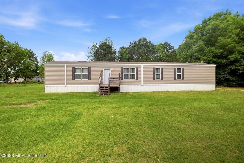 Enjoy the best of both worlds with this like-new 3-bedroom - Beach Home for sale in Long Beach, Mississippi on Beachhouse.com