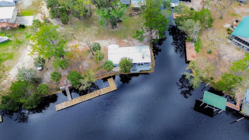 This charming river AND canal front home on the Steinhatchee - Beach Home for sale in Steinhatchee, Florida on Beachhouse.com
