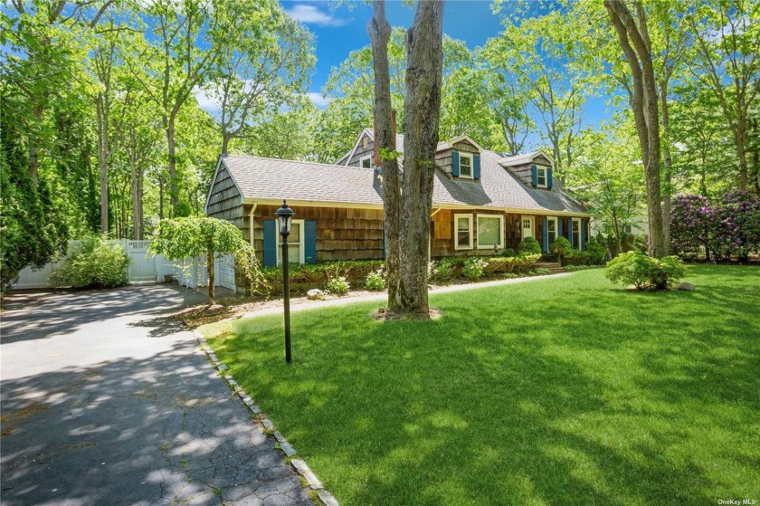 Private & serene 4 bedroom/2bath Cape Cod with a 2 car garage on - Beach Home for sale in East Quogue, New York on Beachhouse.com