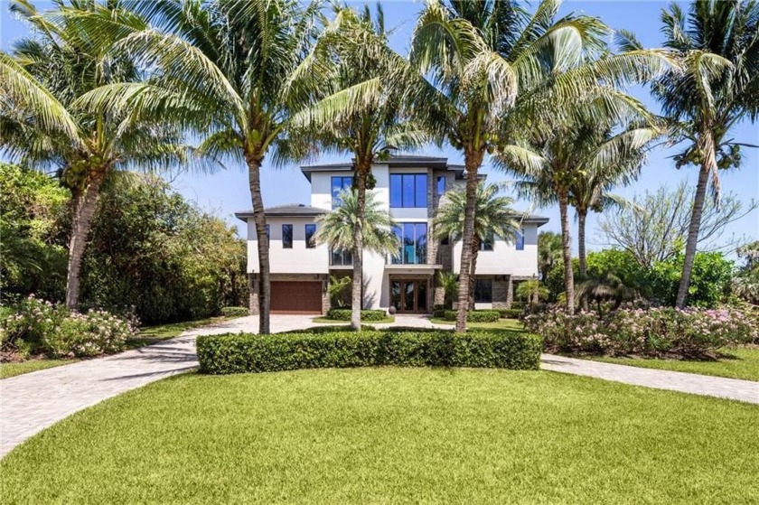 The largest estate in the community, this oceanfront masterpiece - Beach Home for sale in Jensen Beach, Florida on Beachhouse.com