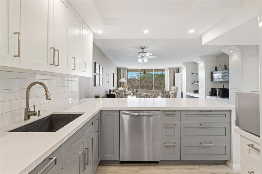 Welcome HOME to this updated corner unit with an open-concept - Beach Condo for sale in Pompano Beach, Florida on Beachhouse.com