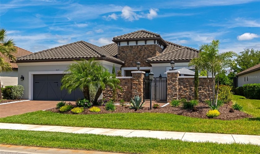Under contract-accepting backup offers. A true standout within - Beach Home for sale in Bradenton, Florida on Beachhouse.com