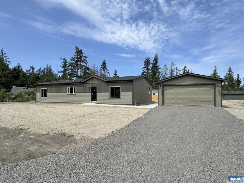 Nestled on a spacious half acre lot in the peaceful Diamond - Beach Home for sale in Sequim, Washington on Beachhouse.com