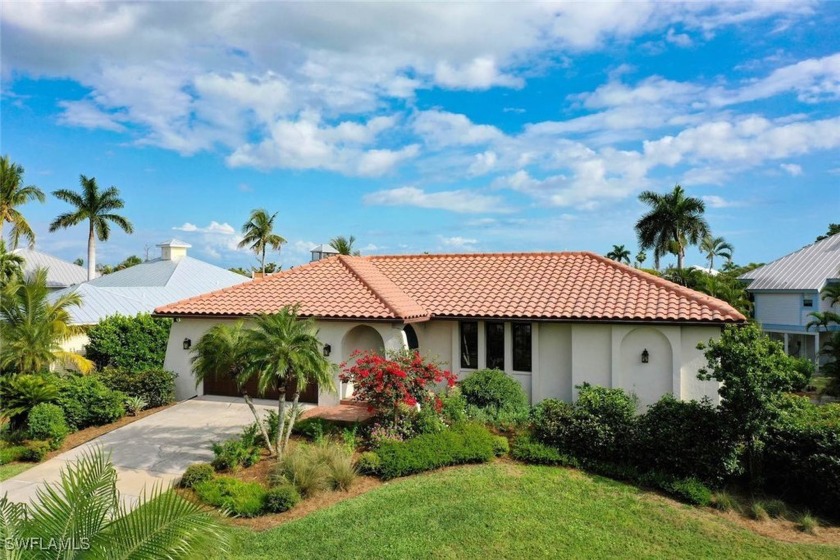 Welcome to *The House on the Hill*, a unique home and garage - Beach Home for sale in Sanibel, Florida on Beachhouse.com