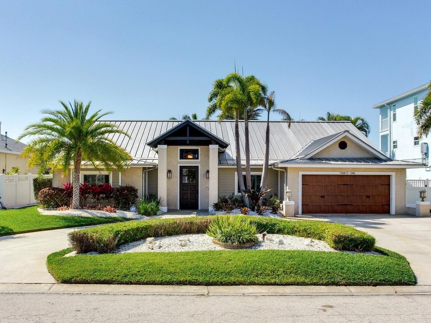 Welcome to this beautifully reimagined waterfront residence in - Beach Home for sale in Belleair Beach, Florida on Beachhouse.com
