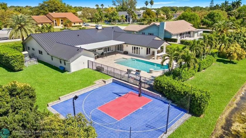 Entertainer's Dream Home!
This Stunning Builder's Acre Estate is - Beach Home for sale in Davie, Florida on Beachhouse.com