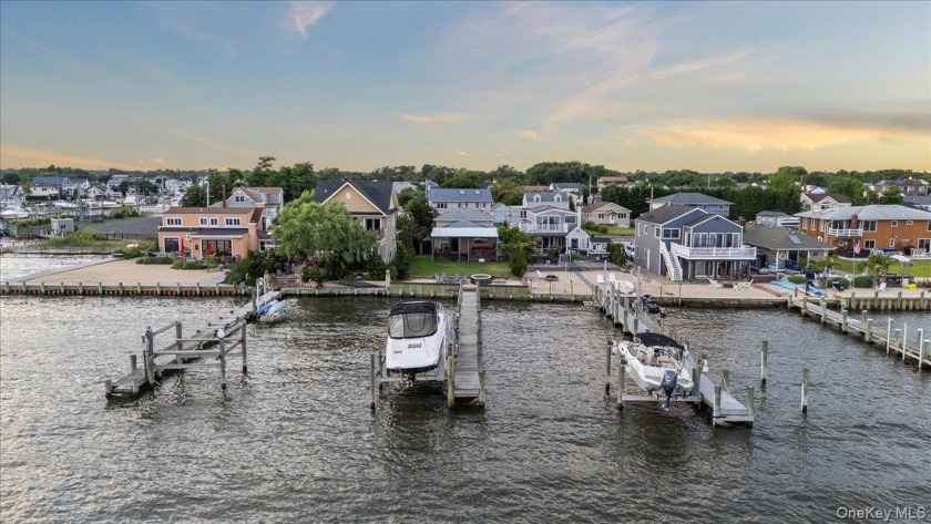 Experience waterfront luxury in the heart of the coveted - Beach Home for sale in Lindenhurst, New York on Beachhouse.com