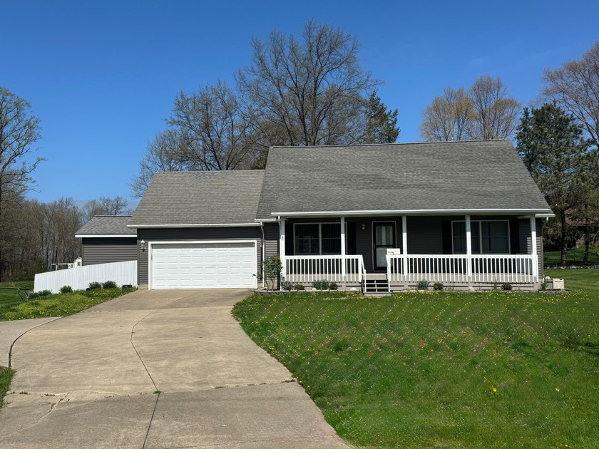 Explore this charming Harborcreek home set on a spacious, fenced - Beach Home for sale in Harborcreek, Pennsylvania on Beachhouse.com