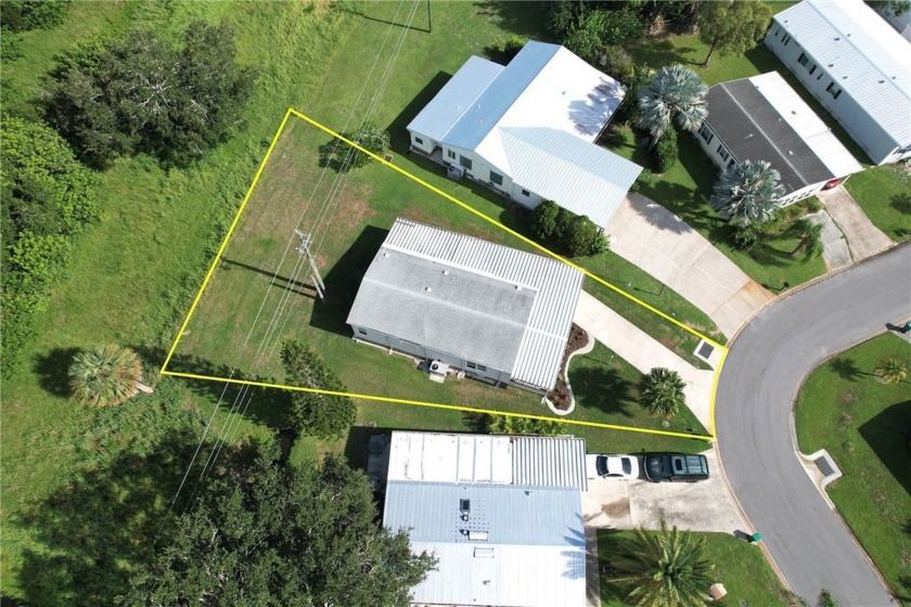 Spacious perimeter lot! This well-maintained home offers an - Beach Home for sale in Barefoot Bay, Florida on Beachhouse.com