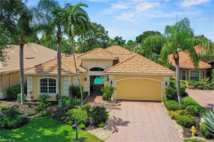 Welcome to this beautiful courtyard home in the prestigious - Beach Home for sale in Estero, Florida on Beachhouse.com