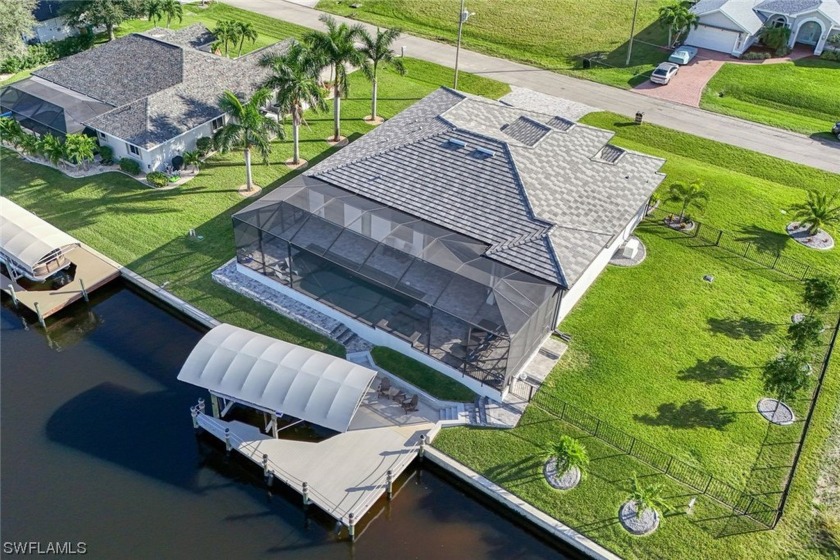 Indulge in waterfront luxury living at this custom-built - Beach Home for sale in Cape Coral, Florida on Beachhouse.com