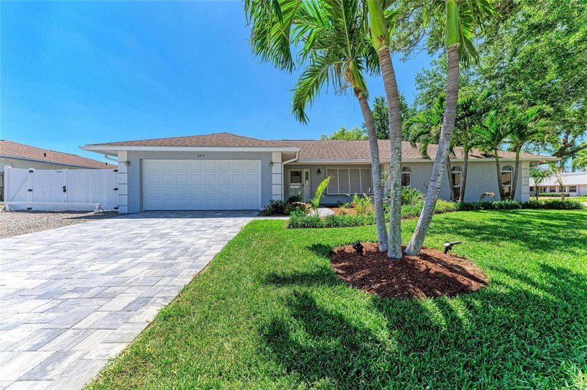 Nestled under a canopy of majestic oak trees in the heart of - Beach Home for sale in Bradenton, Florida on Beachhouse.com