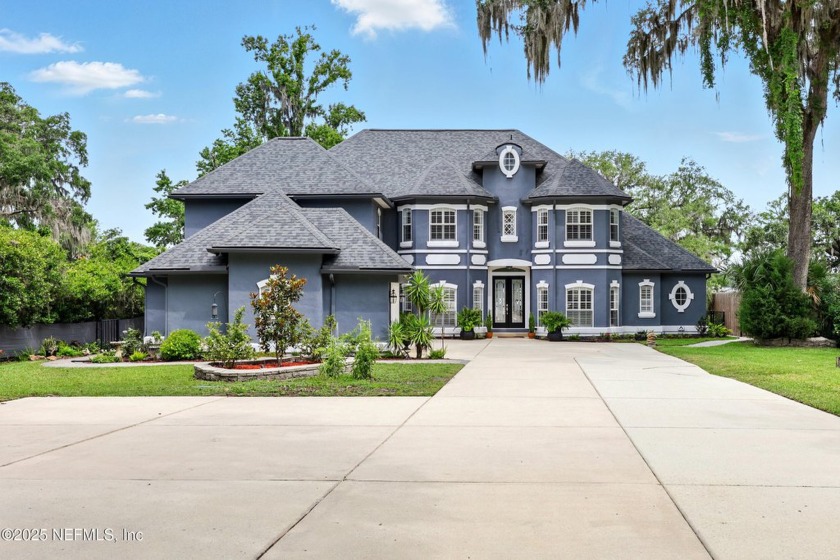 Welcome to your very own GATED, RIVERFRONT PARADISE! This - Beach Home for sale in Saint Johns, Florida on Beachhouse.com
