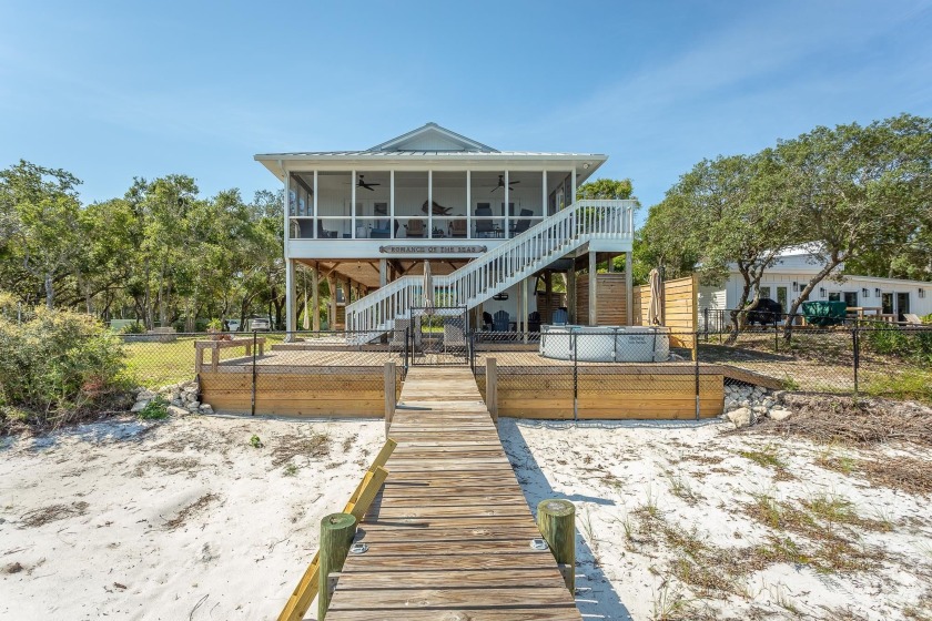 Enjoy spectacular bayfront sunrises from this beautifully - Beach Home for sale in Alligator Point, Florida on Beachhouse.com