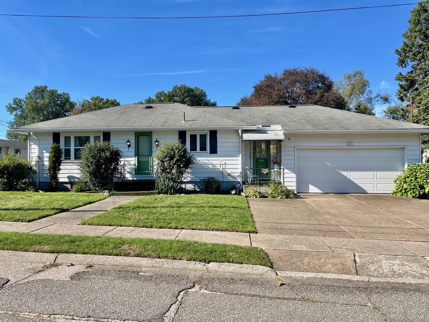 Packed with extras and updates, this low-maintenance, one-story - Beach Home for sale in Erie, Pennsylvania on Beachhouse.com