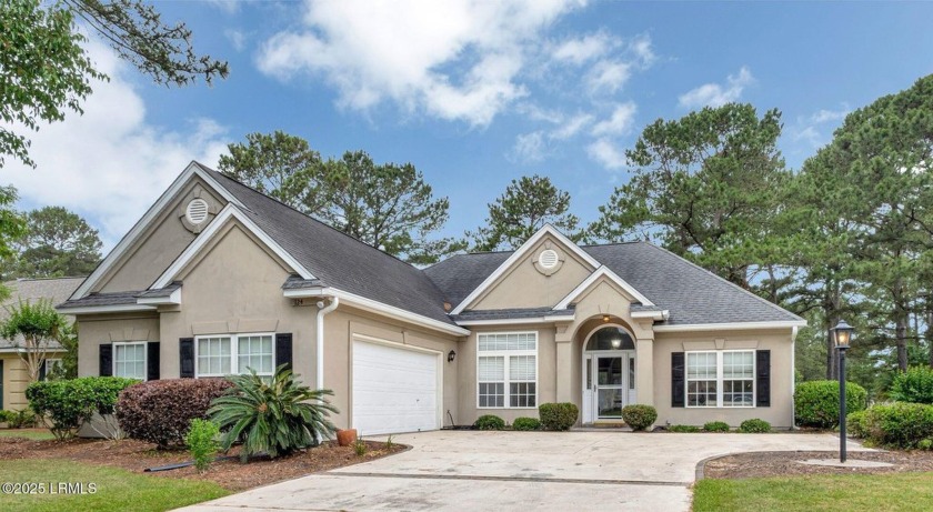 This 3-bedroom home with an office and a sunroom offers a split - Beach Home for sale in Okatie, South Carolina on Beachhouse.com