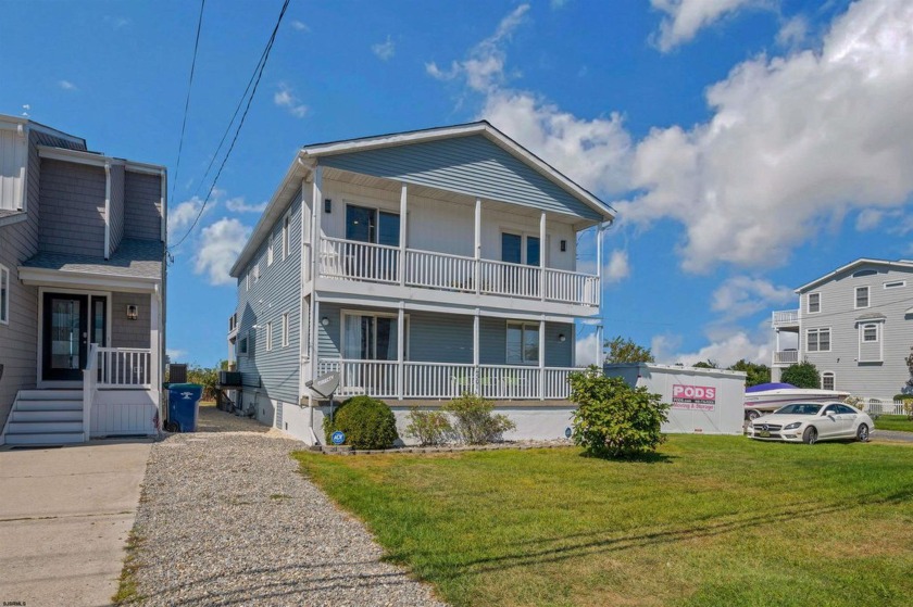 Discover your dream retreat in this stunning upper-floor - Beach Condo for sale in Brigantine, New Jersey on Beachhouse.com