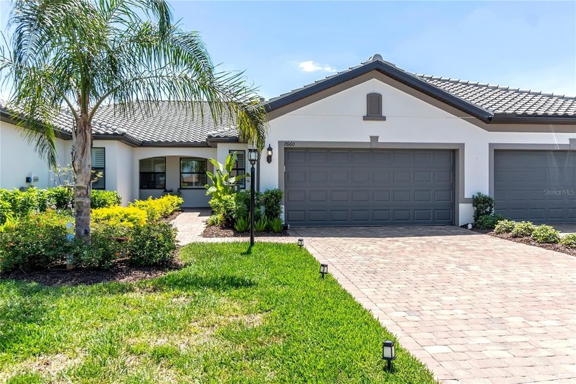 Positioned at 7660 Summerland Cove, this beautifully optimized - Beach Home for sale in Bradenton, Florida on Beachhouse.com