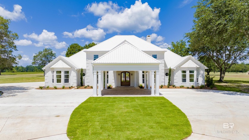 Nestled on an expansive 42 acres, this remarkable estate offers - Beach Home for sale in Robertsdale, Alabama on Beachhouse.com