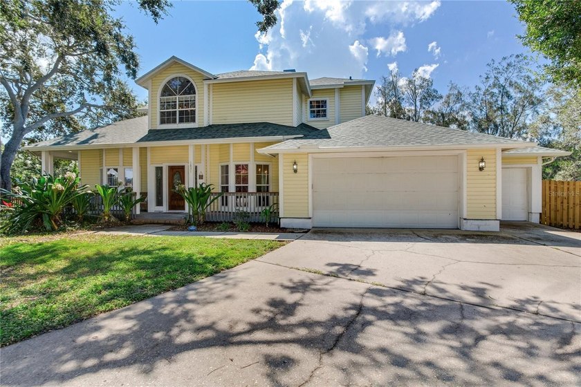 STUNNING 4-BEDROOM, 3-BATH POOL HOME ON A PRIVATE CUL-DE-SAC - Beach Home for sale in Clearwater, Florida on Beachhouse.com