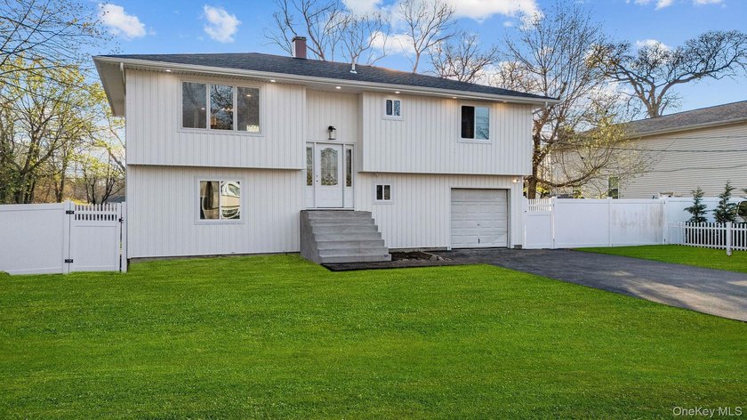 Welcome to this fully renovated 4 bedroom, 2 full bathroom - Beach Home for sale in Mastic Beach, New York on Beachhouse.com