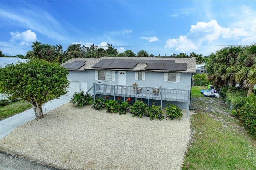 Welcome to 6 Cove Ln, a charming WATERFRONT single-family HEATED - Beach Home for sale in Englewood, Florida on Beachhouse.com