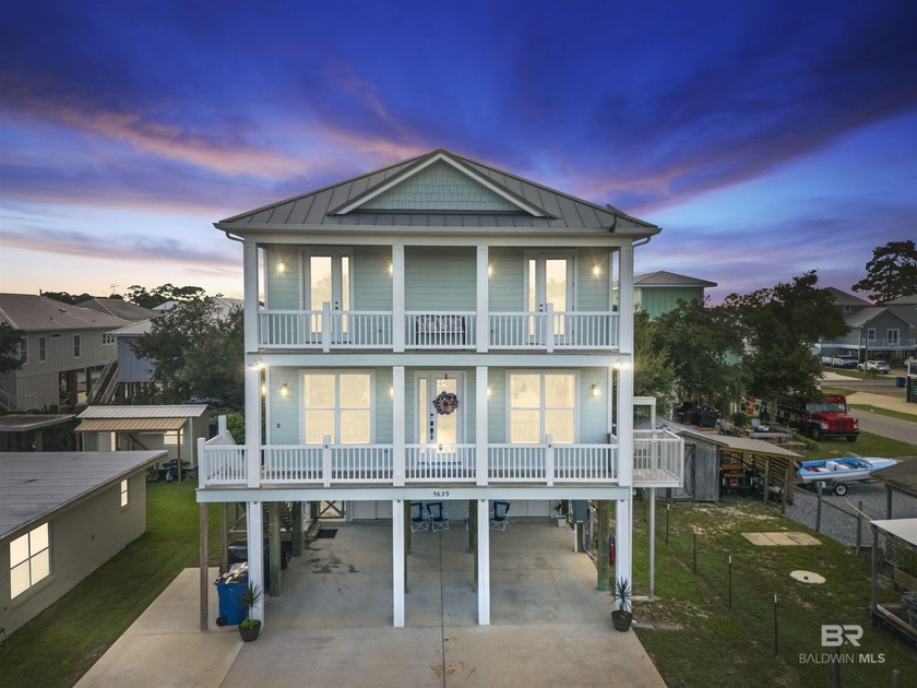 This beautiful home in Bear Point with views of Arnica Bay. The - Beach Home for sale in Orange Beach, Alabama on Beachhouse.com