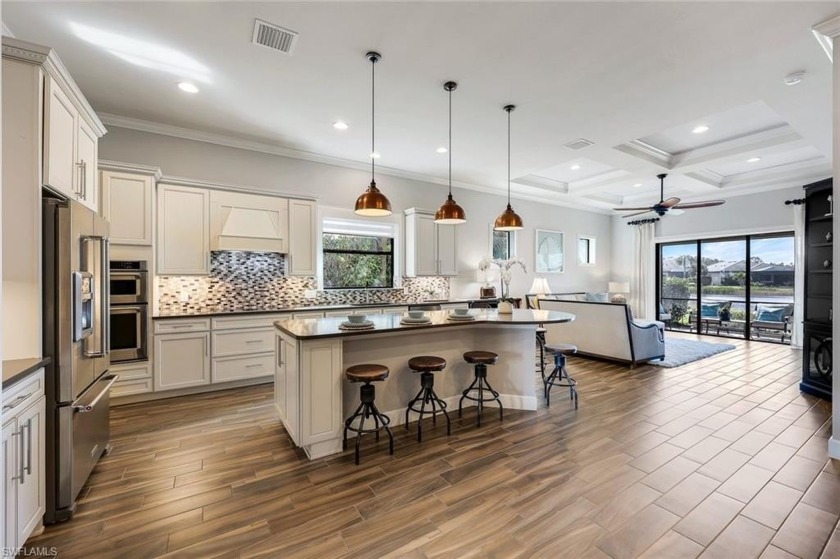 Enter through the front glass door of this 3BR+DEN home which - Beach Home for sale in Estero, Florida on Beachhouse.com