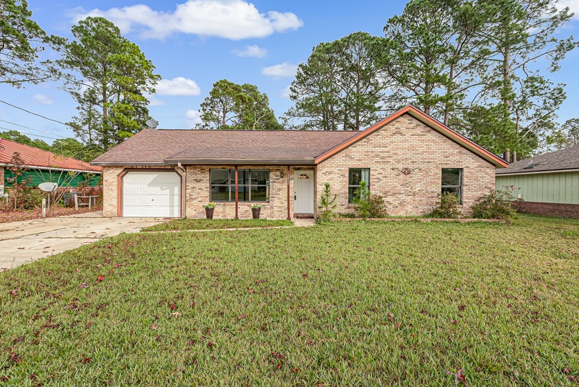 Discover comfort and convenience in this charming 3-bed, 2-bath - Beach Home for sale in Fort Walton Beach, Florida on Beachhouse.com